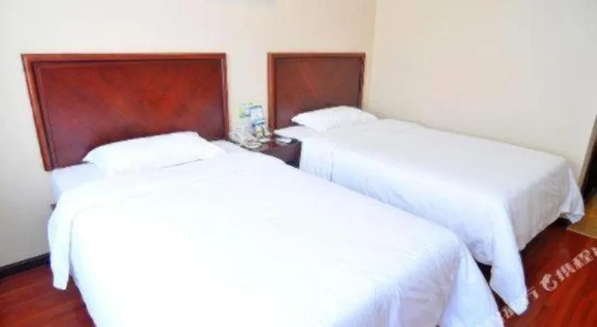 Bed in GreenTree Inn Qingdao Licang Shuyan Road Daweng Square Express Hotel