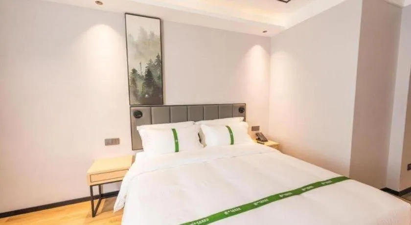 Bed in GreenTree Inn Qingdao Licang Shuyan Road Daweng Square Express Hotel