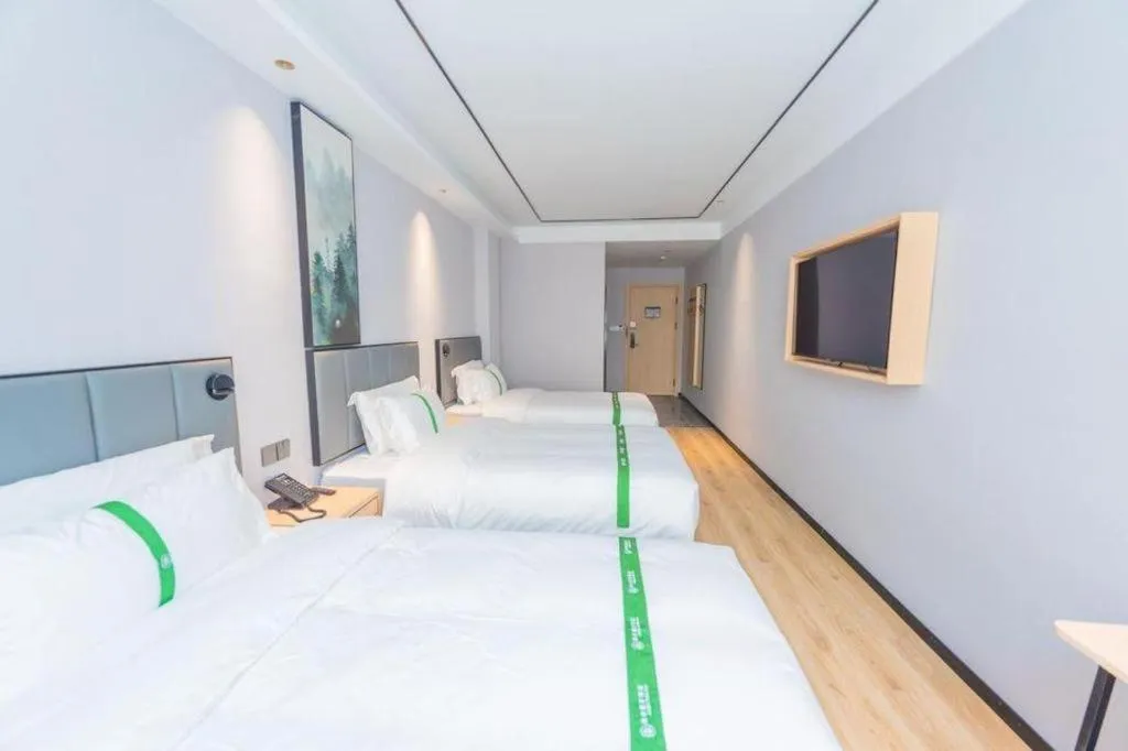 Bed in GreenTree Inn Qingdao Licang Shuyan Road Daweng Square Express Hotel