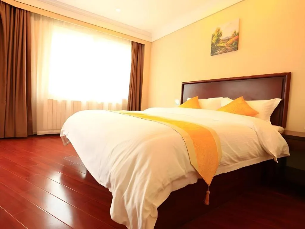 Bed in GreenTree Inn Qingdao Licang Shuyan Road Daweng Square Express Hotel