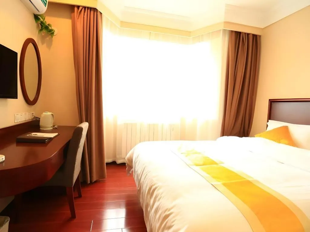 Bed in GreenTree Inn Qingdao Licang Shuyan Road Daweng Square Express Hotel