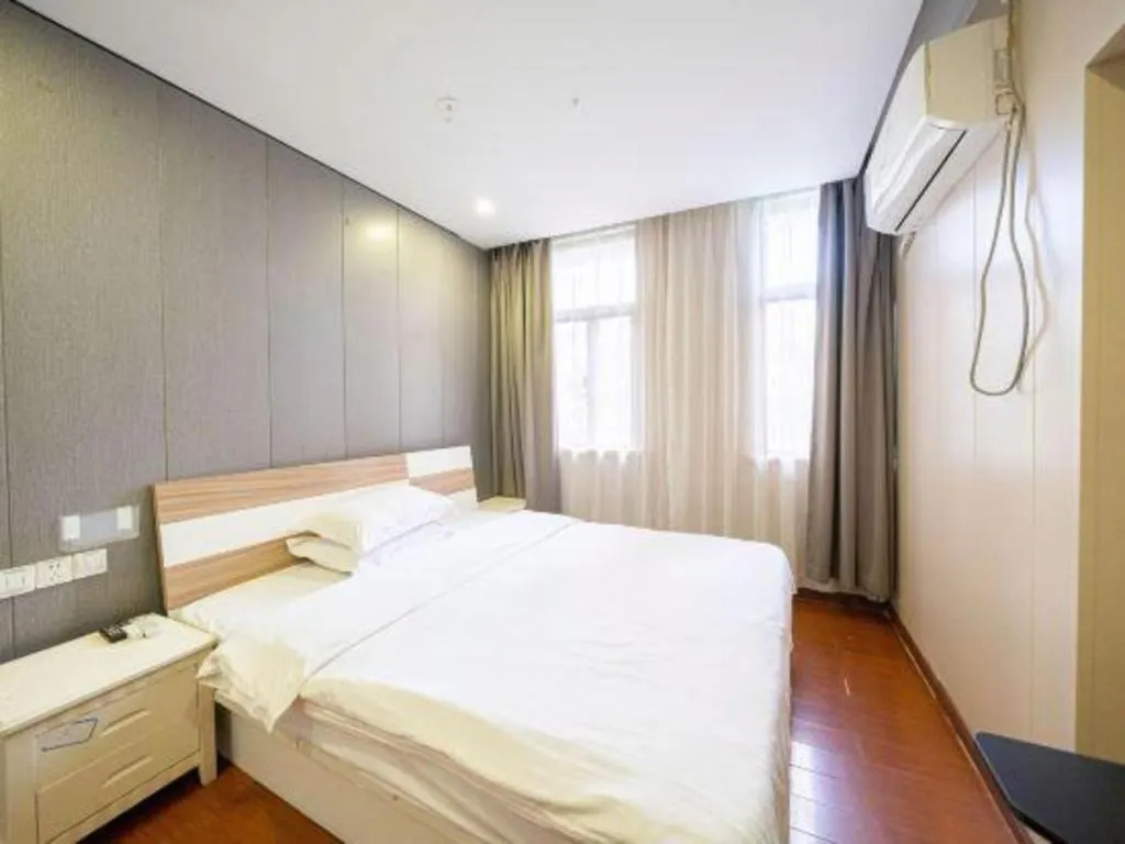 Bed in GreenTree Alliance Shanghai Railway Station QiuJiang Road Hotel