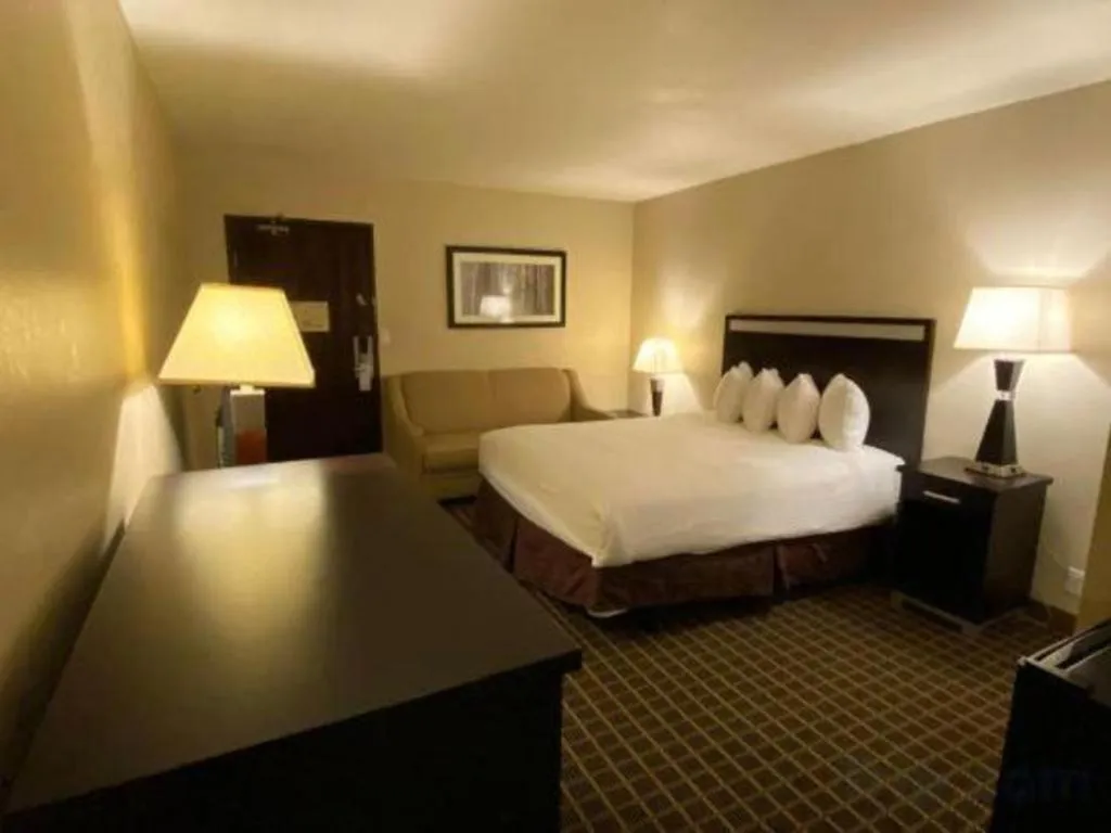 Bed in Alhambra Hotel