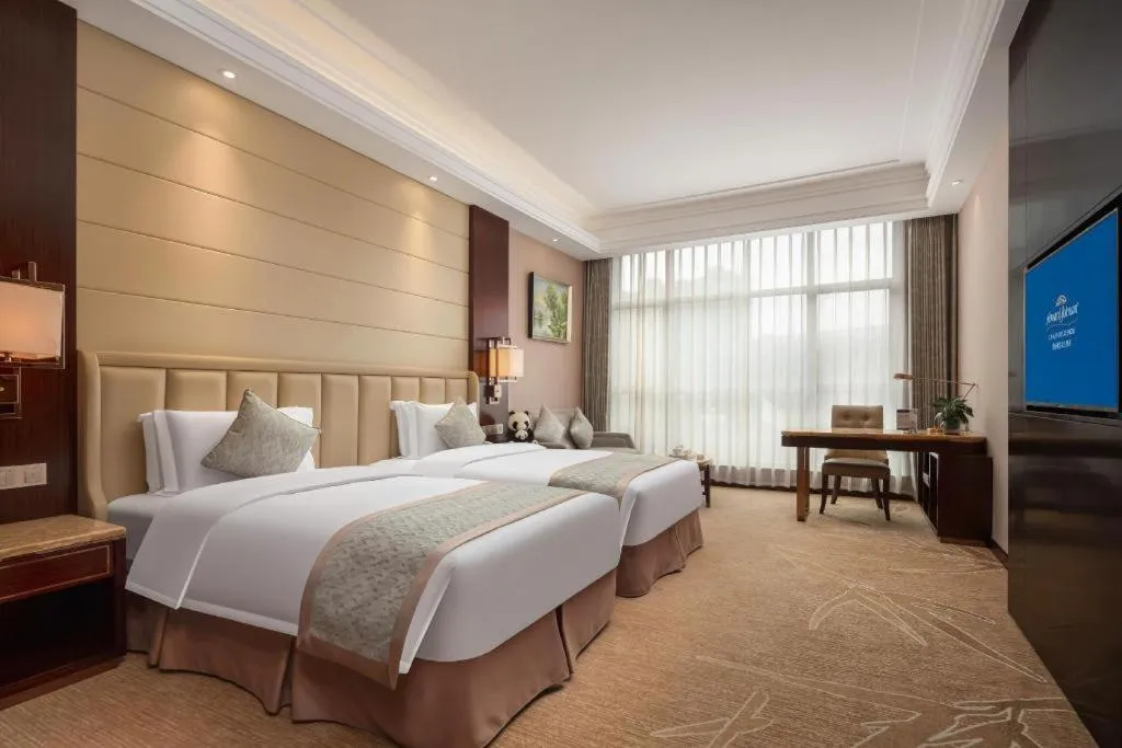 Bed in Howard Johnson Zunyue Hotel Chengdu