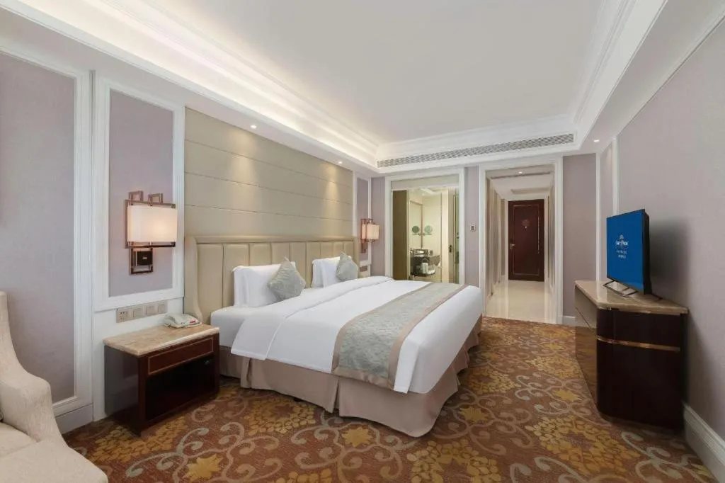 Bed in Howard Johnson Zunyue Hotel Chengdu