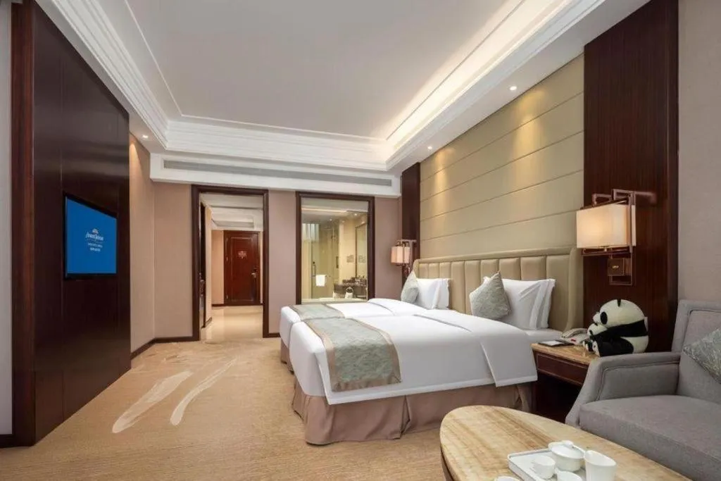 Bed in Howard Johnson Zunyue Hotel Chengdu