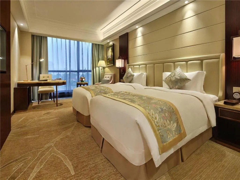 Bed in Howard Johnson Zunyue Hotel Chengdu