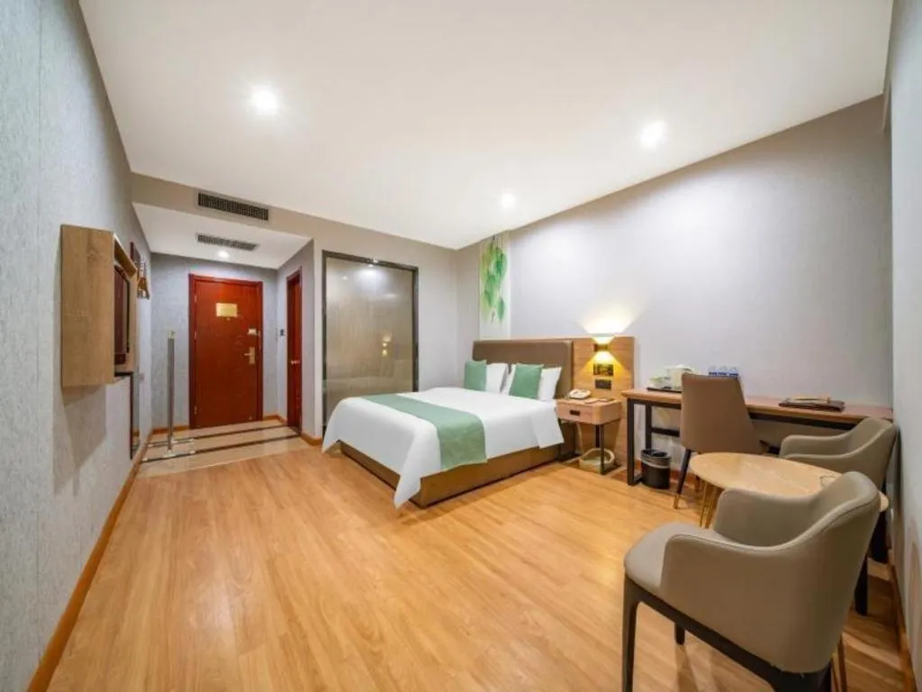 Bed in GreenTree Inn Jining Yanzhou Jiuzhou Fangyuan Business Hotel