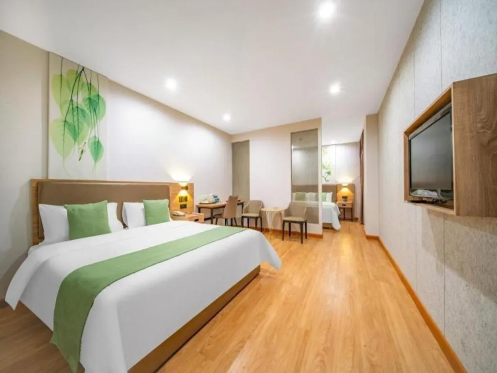 Bed in GreenTree Inn Jining Yanzhou Jiuzhou Fangyuan Business Hotel