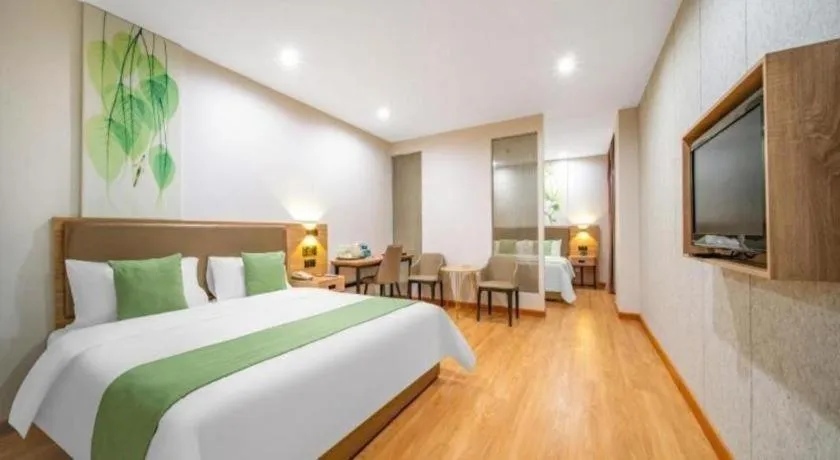 Bed in GreenTree Inn Jining Yanzhou Jiuzhou Fangyuan Business Hotel