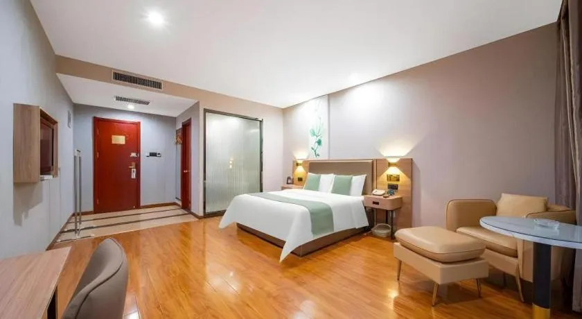 Bed in GreenTree Inn Jining Yanzhou Jiuzhou Fangyuan Business Hotel