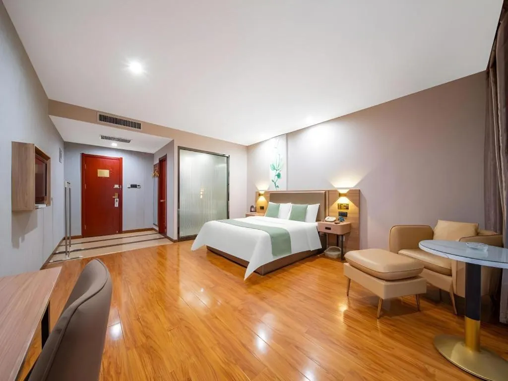 Bed in GreenTree Inn Jining Yanzhou Jiuzhou Fangyuan Business Hotel