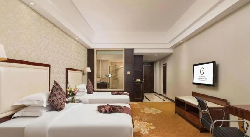 Bed in Country Garden Phoenix Hotel Maoming