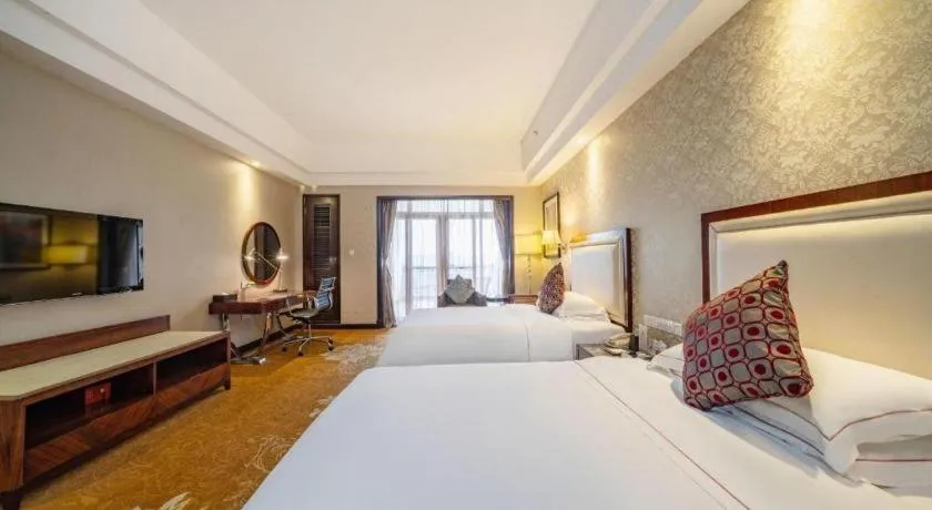 Bed in Country Garden Phoenix Hotel Maoming