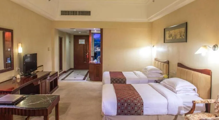 Bed in Country Garden Phoenix Hotel Maoming