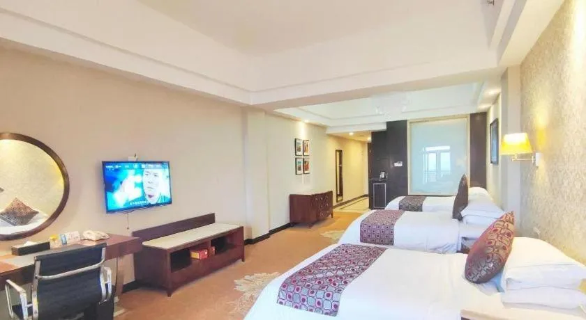Bed in Country Garden Phoenix Hotel Maoming