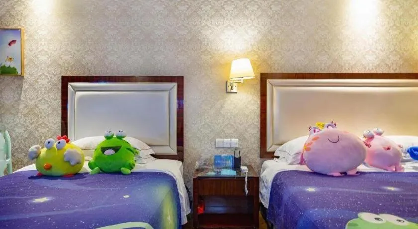 Bed in Country Garden Phoenix Hotel Maoming