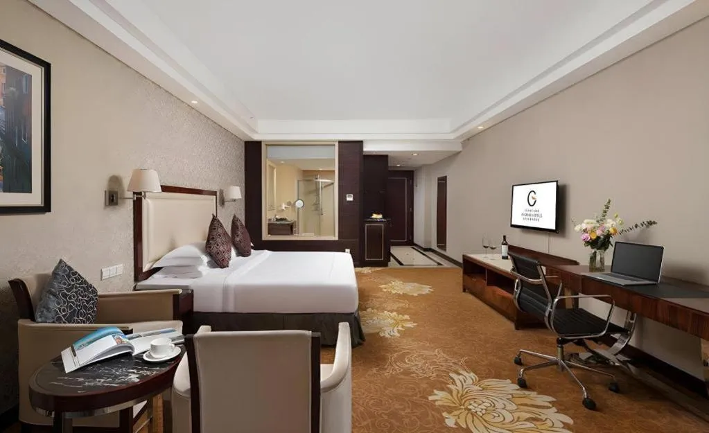 Bed in Country Garden Phoenix Hotel Maoming