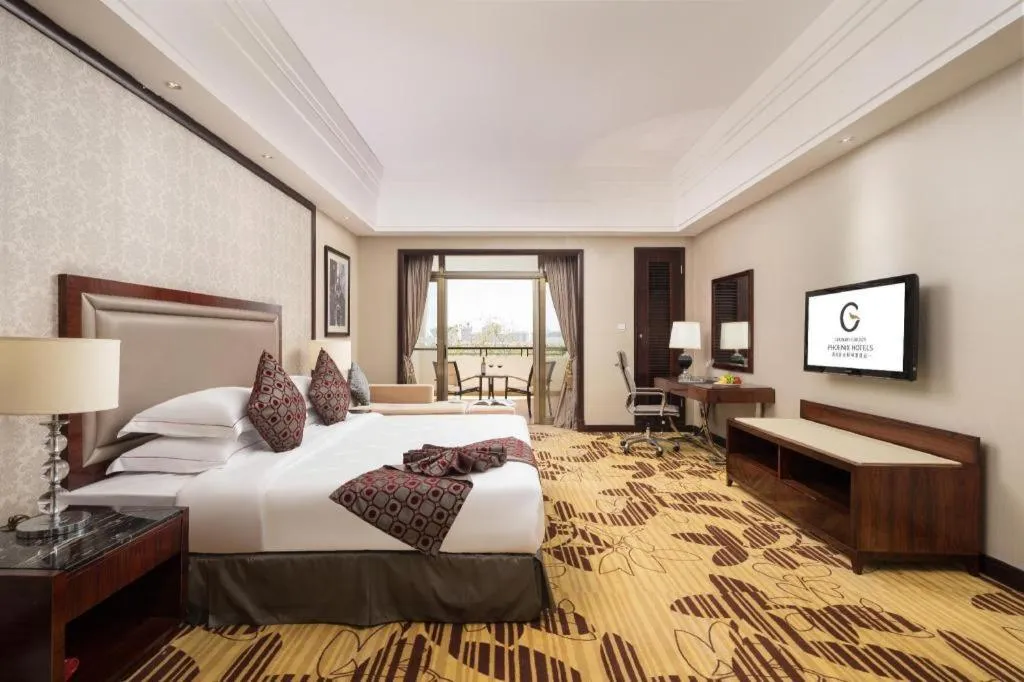 Bed in Country Garden Phoenix Hotel Maoming