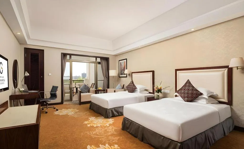 Bed in Country Garden Phoenix Hotel Maoming