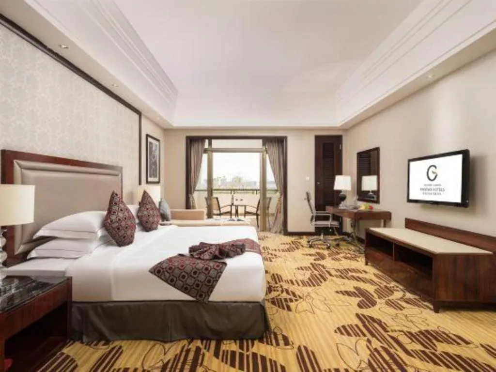 Bed in Country Garden Phoenix Hotel Maoming