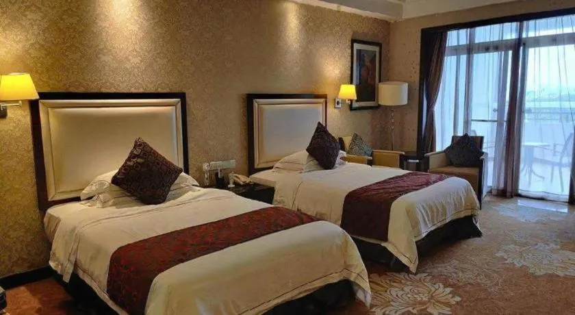Bed in Country Garden Phoenix Hotel Maoming