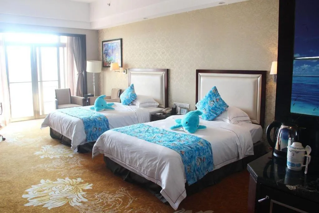 Bed in Country Garden Phoenix Hotel Maoming