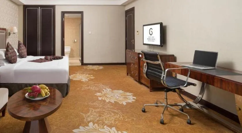 Bed in Country Garden Phoenix Hotel Maoming