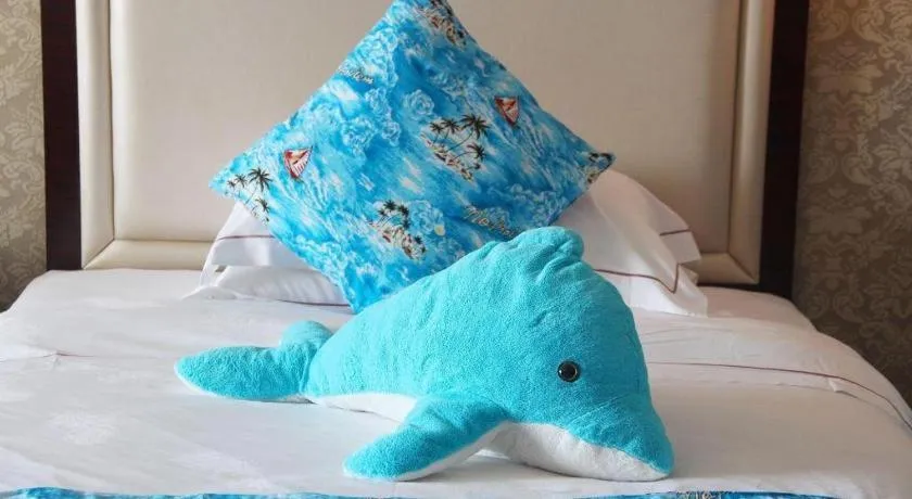 Bed in Country Garden Phoenix Hotel Maoming