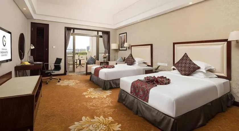 Bed in Country Garden Phoenix Hotel Maoming