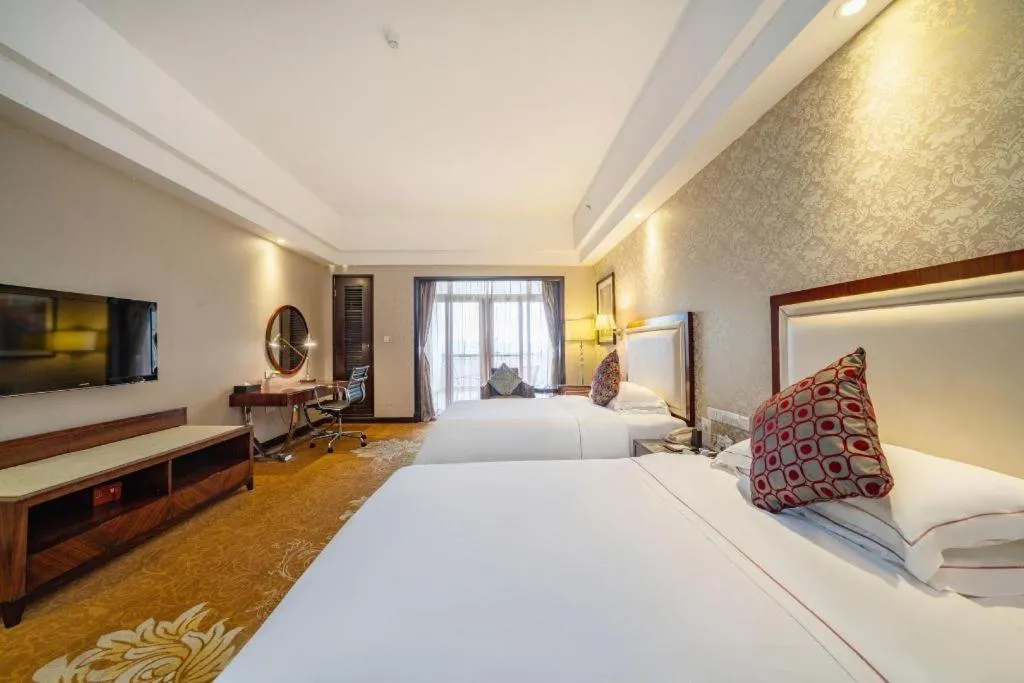 Bed in Country Garden Phoenix Hotel Maoming