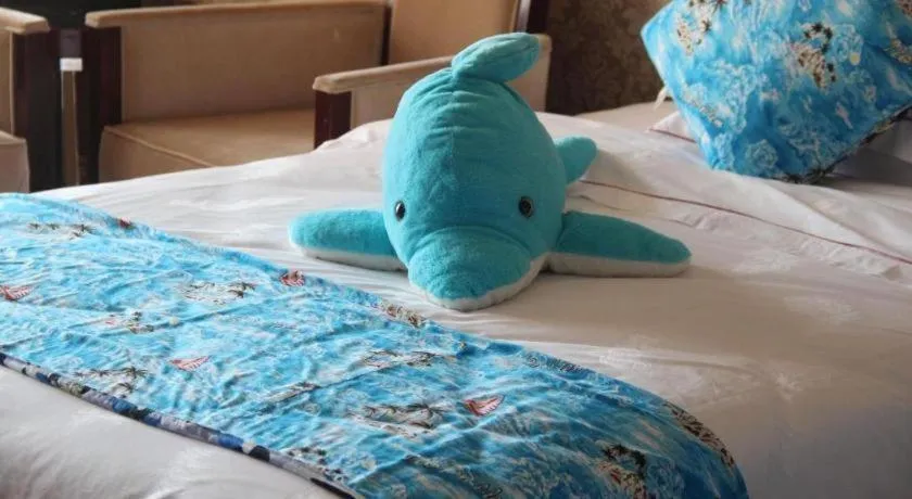 Bed in Country Garden Phoenix Hotel Maoming