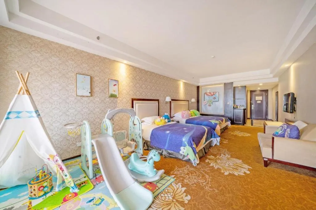 Bed in Country Garden Phoenix Hotel Maoming