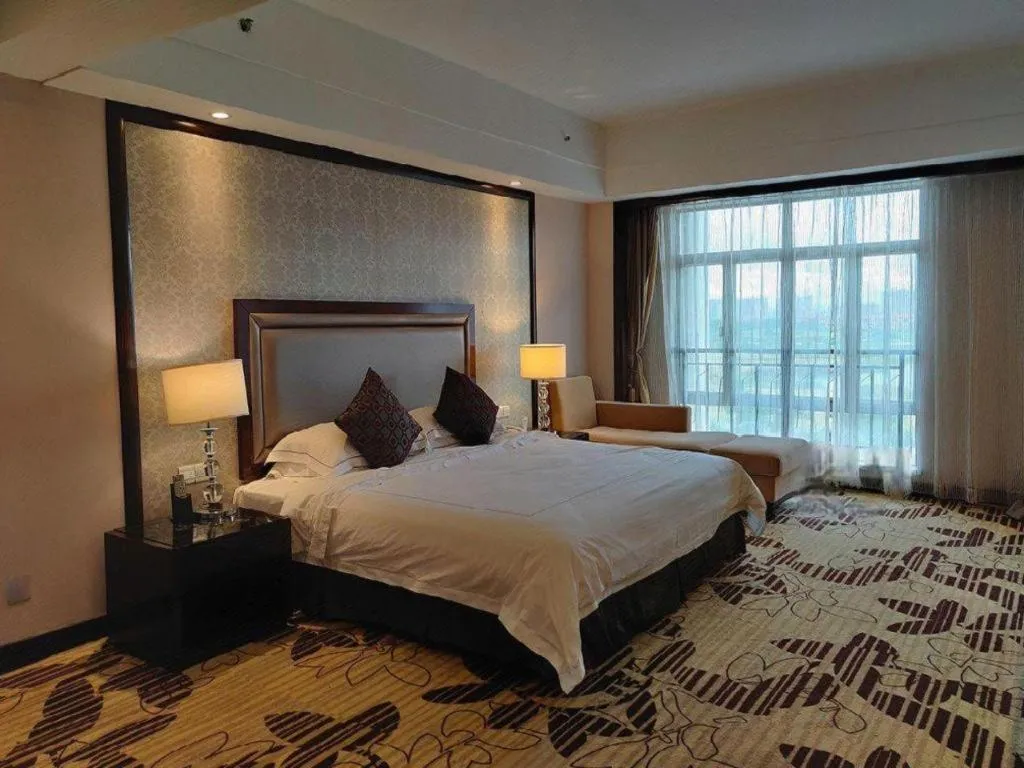 Bed in Country Garden Phoenix Hotel Maoming