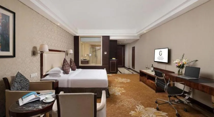 Bed in Country Garden Phoenix Hotel Maoming