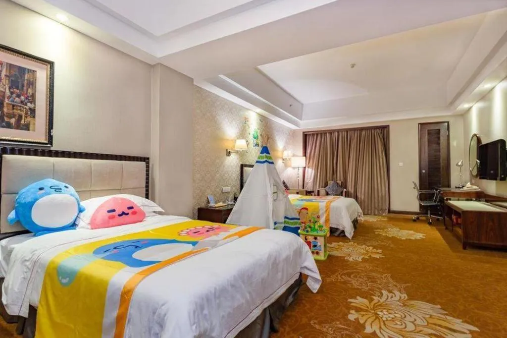 Bed in Country Garden Phoenix Hotel Maoming