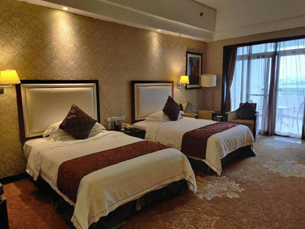 Bed in Country Garden Phoenix Hotel Maoming