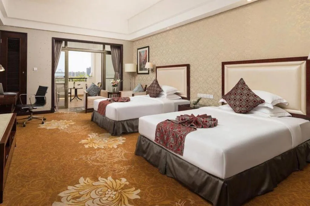 Bed in Country Garden Phoenix Hotel Maoming