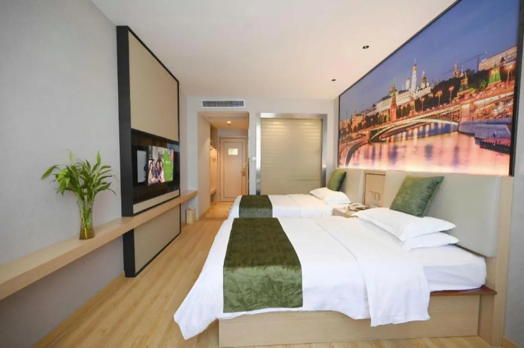 Bed in GreenTree Inn Jiangsu Zhangjiagang Jingang Town Darunfa Express Hotel