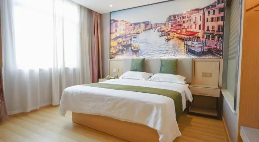 Bed in GreenTree Inn Jiangsu Zhangjiagang Jingang Town Darunfa Express Hotel