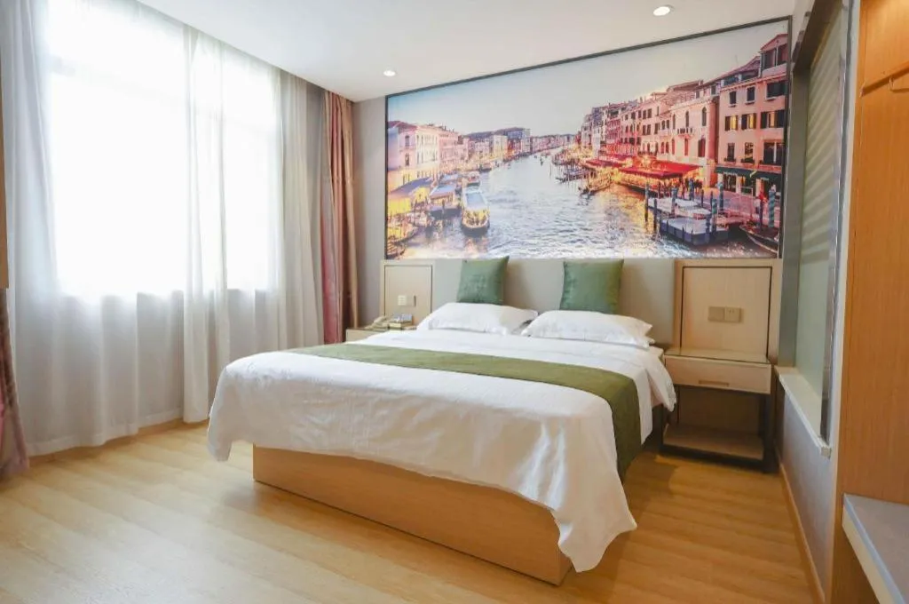 Bed in GreenTree Inn Jiangsu Zhangjiagang Jingang Town Darunfa Express Hotel