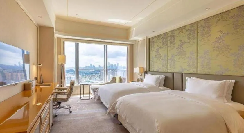 Bed in Ming Du Lakeside Hotel Nanning