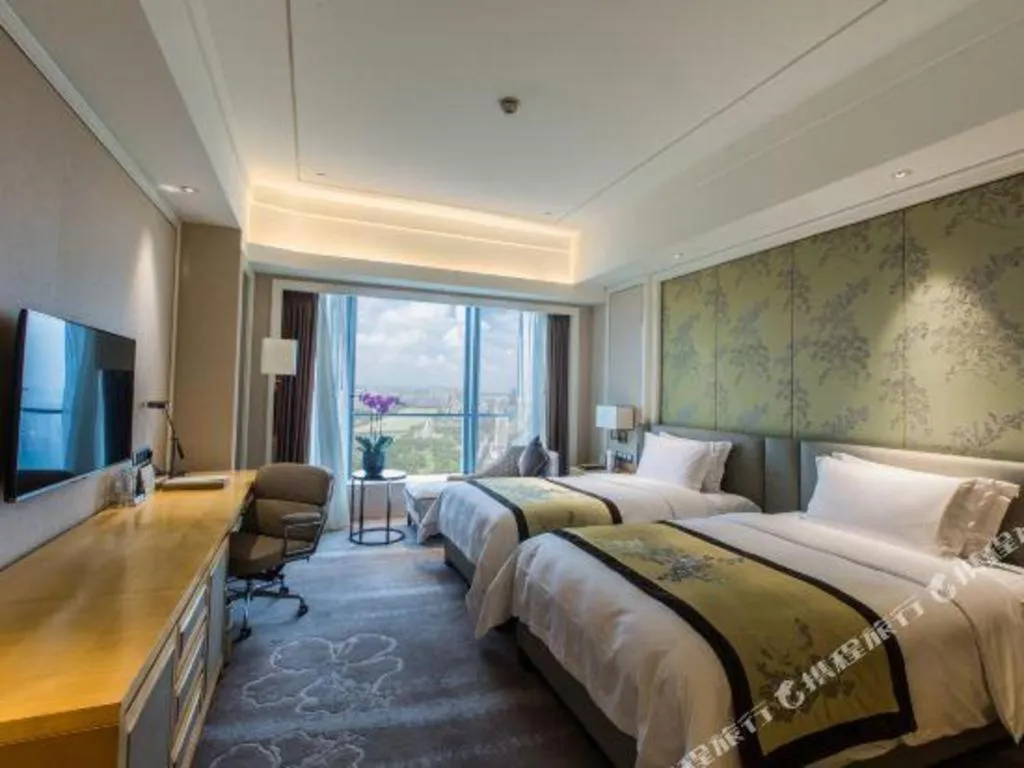 Bed in Ming Du Lakeside Hotel Nanning