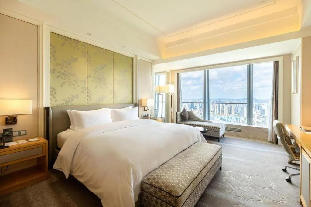 Bed in Ming Du Lakeside Hotel Nanning