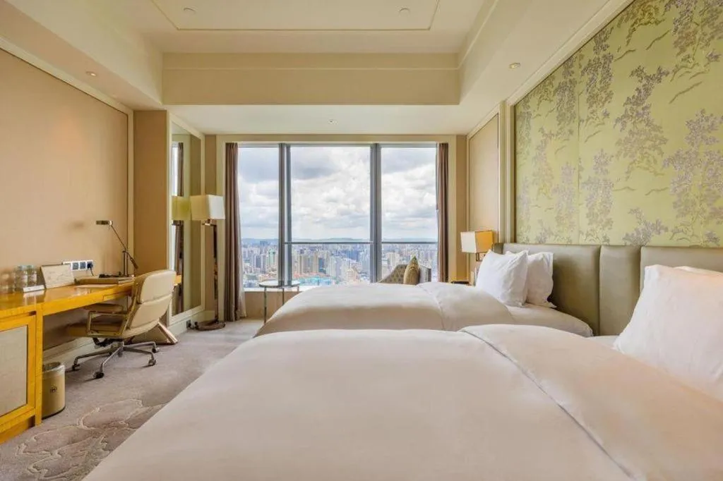 Bed in Ming Du Lakeside Hotel Nanning