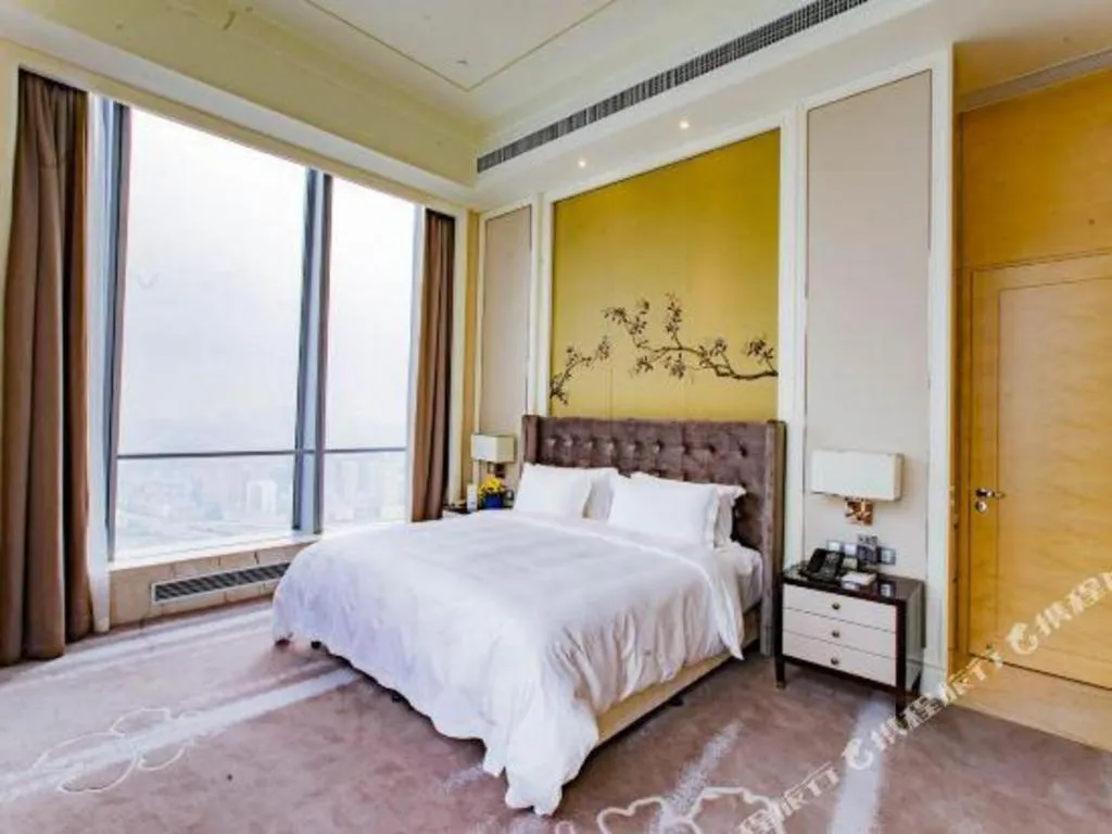 Bed in Ming Du Lakeside Hotel Nanning