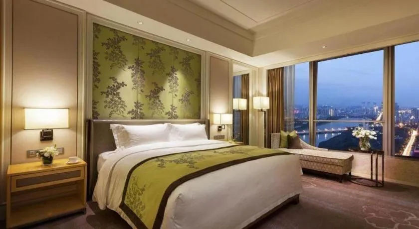 Bed in Ming Du Lakeside Hotel Nanning