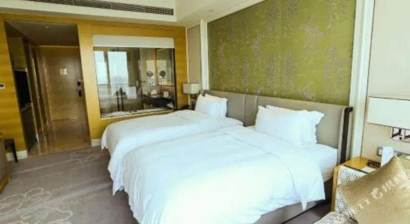 Bed in Ming Du Lakeside Hotel Nanning