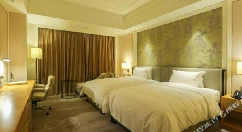 Bed in Ming Du Lakeside Hotel Nanning