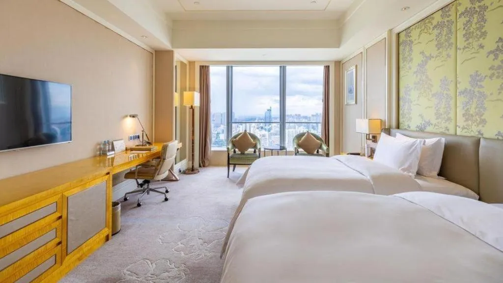 Bed in Ming Du Lakeside Hotel Nanning